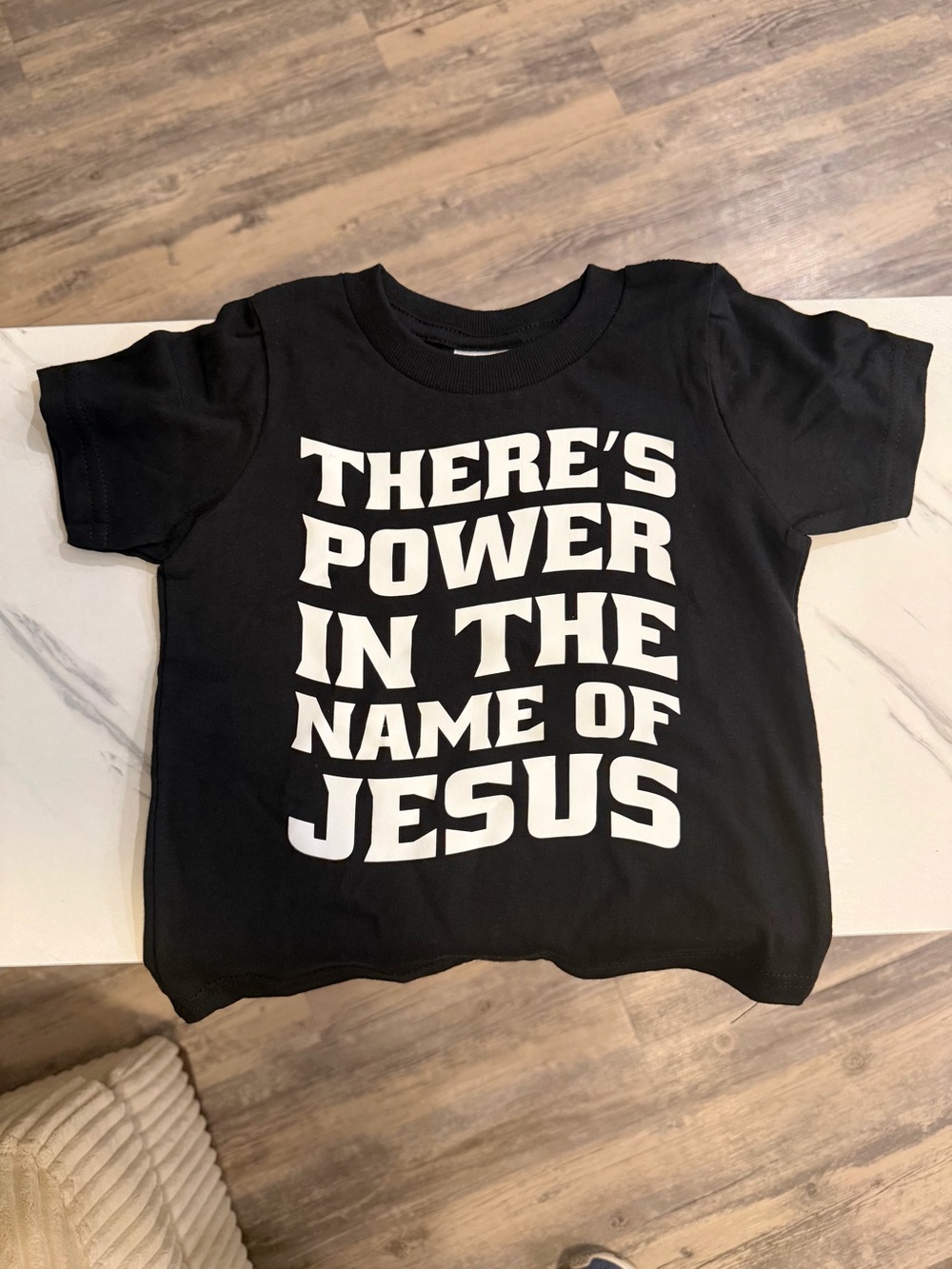 Kids Black Graphic Tee - "There's Power In The Name Of Jesus"